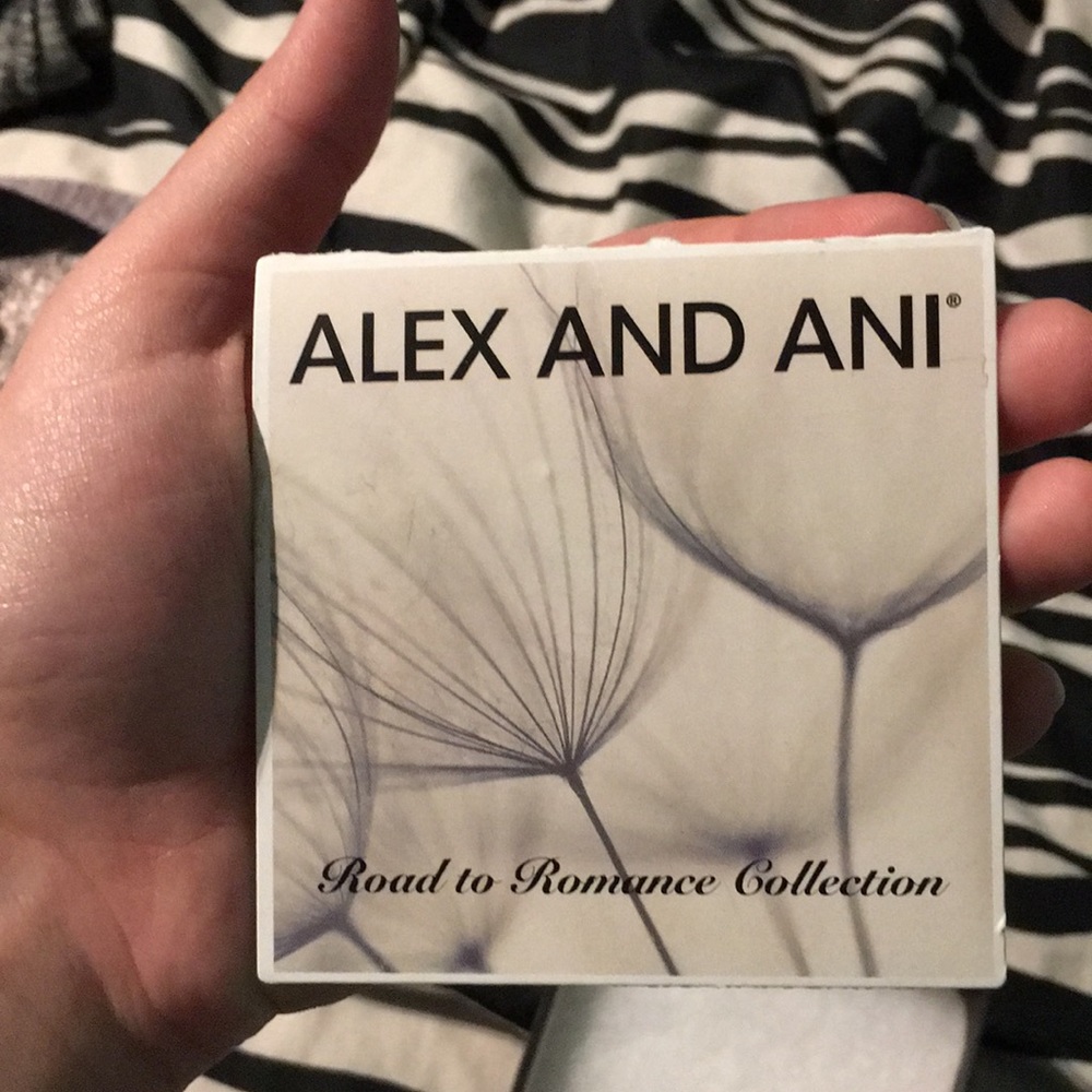 A blue Alex and Ani bracelet. - Picture 3 of 4